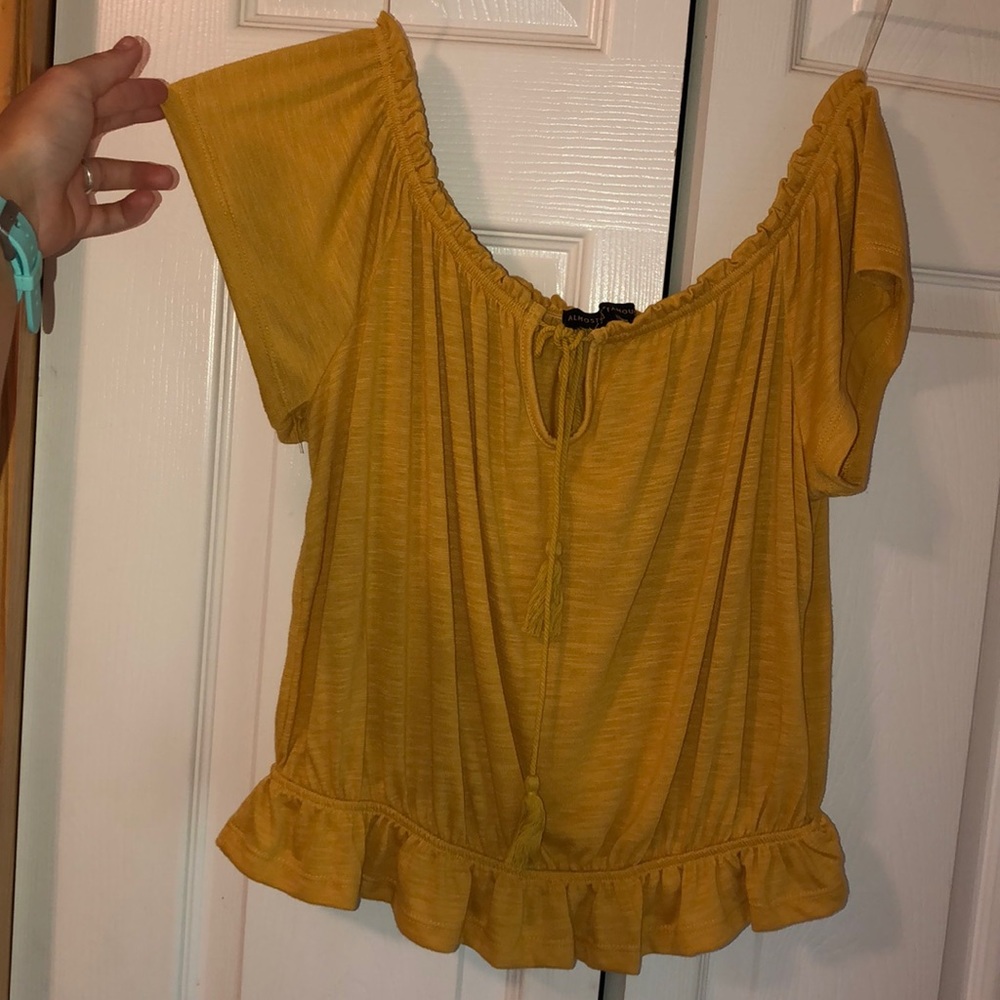 Mustard color women’s off the shoulder shirt